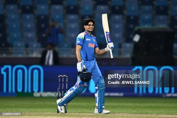 India's Shubman Gill celebrates after scoring a century during the ICC Champions Trophy one-day international cricket match between Bangladesh and...