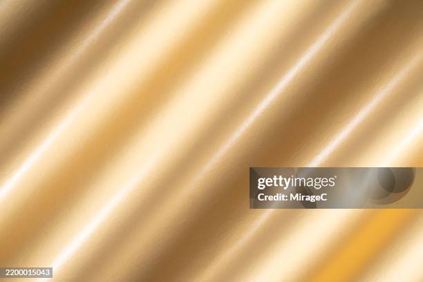 rippled gold background - carta stagnola foto e immagini stock