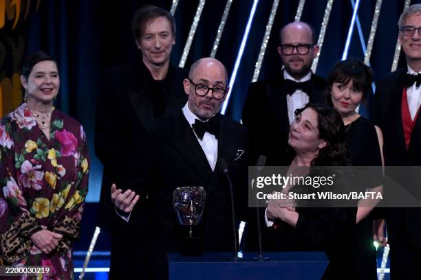 Edward Berger, Tessa Ross, cast and crew accept the Best Film Award for 'Conclave' on stage during the EE BAFTA Film Awards 2025 at The Royal...
