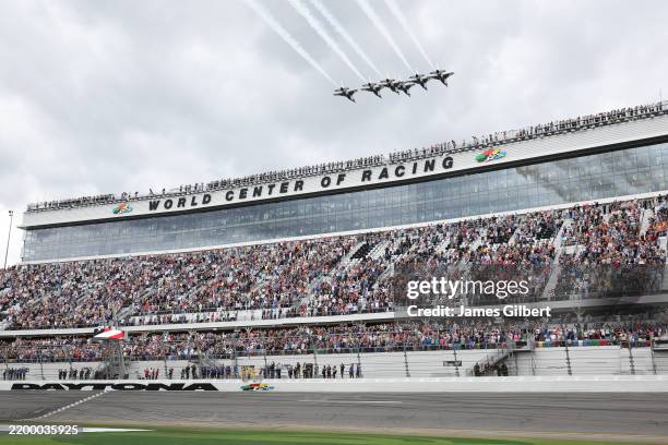 The U.S. Air Force Thunderbirds perform a flyover prior to the NASCAR Cup Series Daytona 500 at Daytona International Speedway on February 16, 2025...