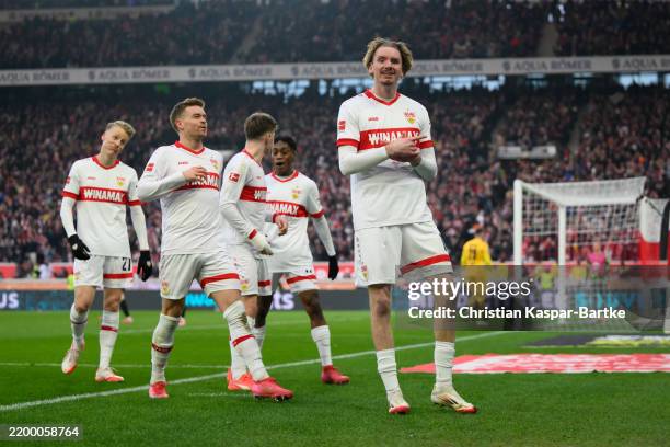 Nick Woltemade of VfB Stuttgart celebrates after scoring his team’s first goal during the Bundesliga match between VfB Stuttgart and VfL Wolfsburg at...