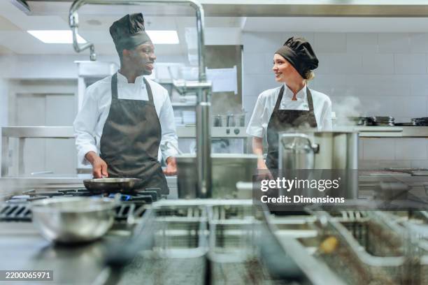 Cooking Staff 712 Busy Kitchen Staff Stock Photos, High-Res Pictures, and Images ...