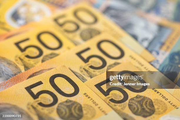 australian dollar banknotes. close up of australian dollar $50 notes. - australian dollars stock pictures, royalty-free photos & images