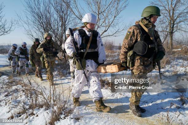 Infantry soldiers of the Armed Forces of Ukraine, including both new recruits and experienced servicemen, train together before deployment to the...