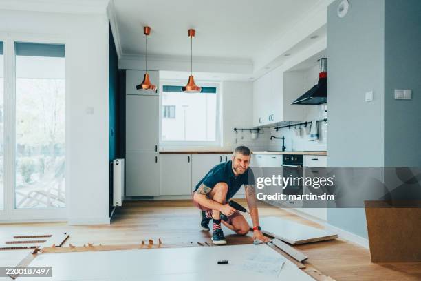 moving house concept - installing kitchen stock pictures, royalty-free photos & images