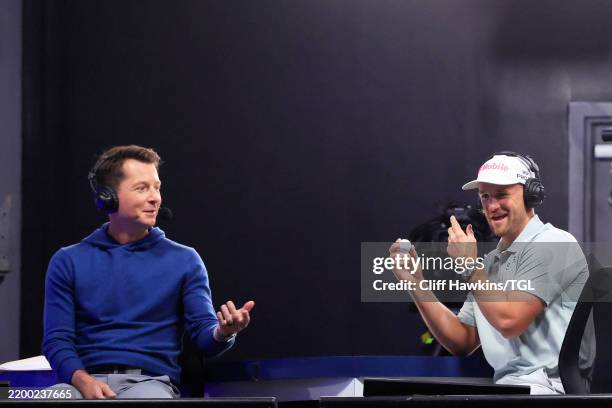 Broadcaster Matt Barrie talks to Wyndham Clark of The Bay Golf Club in the broadcast booth during the TGL presented by SoFi match between ATL and LA...