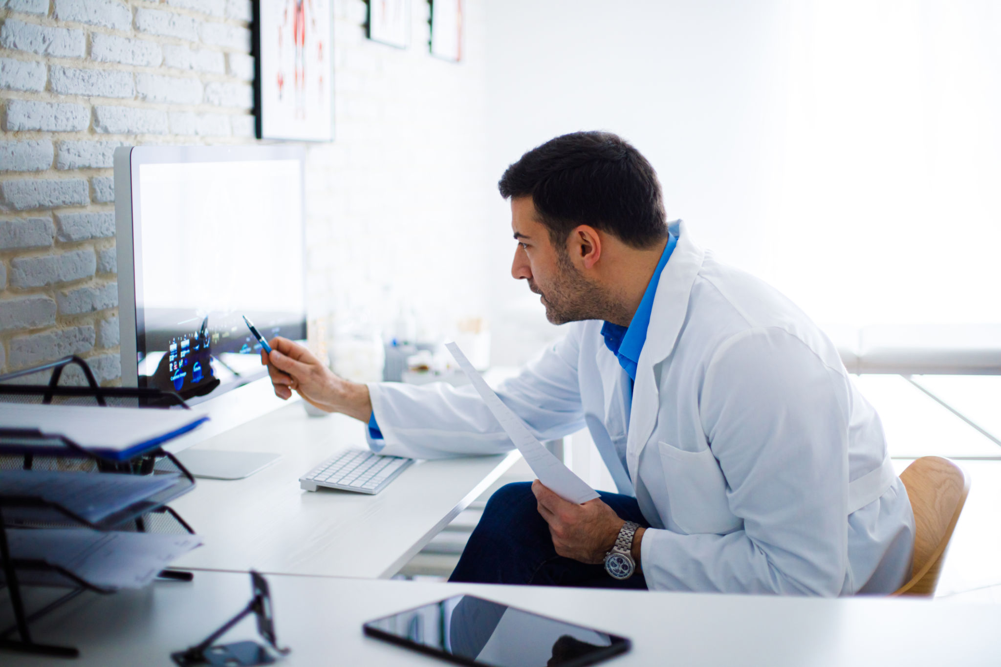 doctor analyzing data