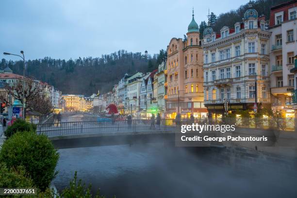 scenic karlovy vary cityscape at dusk - karlovy vary stock pictures, royalty-free photos & images