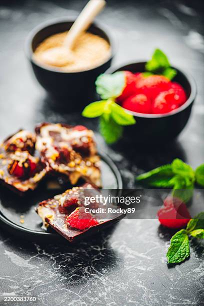 vegan frozen yoghurt chocolate bites with raspberries and tahini - tahini stock pictures, royalty-free photos & images