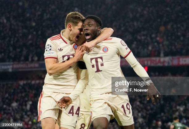 Alphonso Davies of Bayern Munich celebrates scoring his team's first goal with teammate Josip Stanisic during the UEFA Champions League 2024/25...