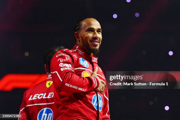 Lewis Hamilton of Great Britain and Scuderia Ferrari waves to the crowd from the stage during F1 75 Live at The O2 Arena on February 18, 2025 in...