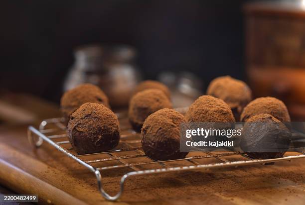 delicious homemade chocolate truffles - icing ball cake stock pictures, royalty-free photos & images