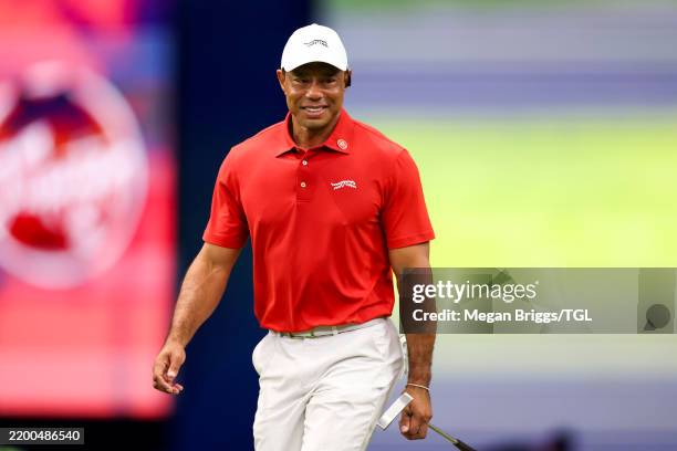 Tiger Woods of Jupiter Links Golf Club looks on while playing the fourth hole during their TGL presented by SoFi match against New York Golf Club...