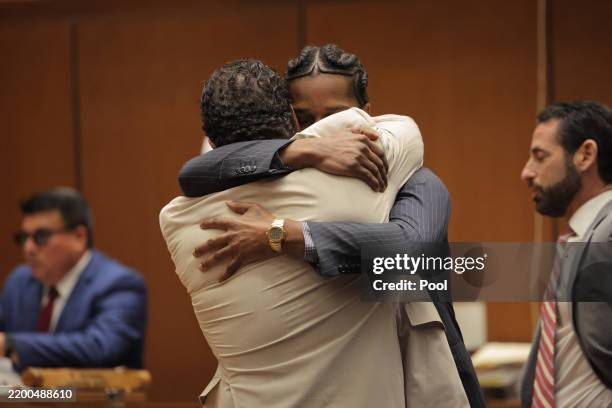 Rakim Mayers, aka A$AP Rocky, embraces attorney Joe Tacopina in court as the verdict is given in his felony assault trial at Clara Shortridge Foltz...