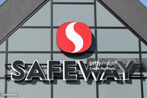 The Safeway logo displayed at the entrance to a local Safeway store in Edmonton, Alberta, Canada, on February 20, 2025.
