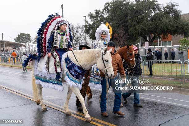 People take part in the Abrazo celebration as people gather at the Juarez-Lincoln International Bridge on the US-Mexico border in Laredo, Texas on...