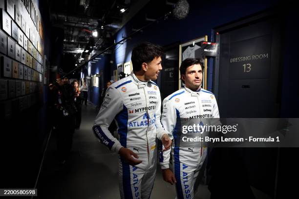 Carlos Sainz of Spain and Williams and team mate Alexander Albon of Thailand are seen backstage during F1 75 Live at The O2 Arena on February 18,...