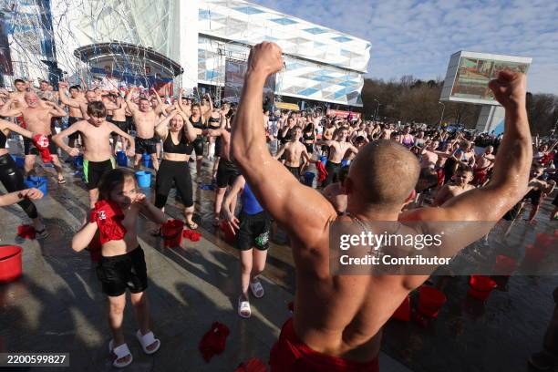Participants shout during the "Being Healthy is Fashionable", an event, hosted by the military-sportive club "Yaropolk", which is headed by Federal...