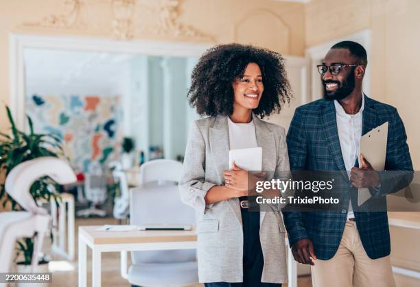 business people in the office. - mid adult stock pictures, royalty-free photos & images