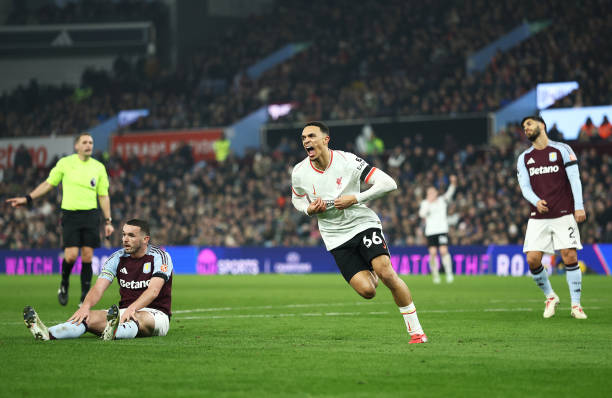 Trent Alexander-Arnold of Liverpool celebrates scoring his team's second goal during the Premier League match between Aston Villa FC and Liverpool FC...