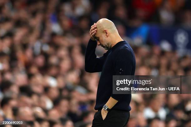Pep Guardiola, Manager of Manchester City, looks dejected during the UEFA Champions League 2024/25 League Knockout Play-off second leg match between...