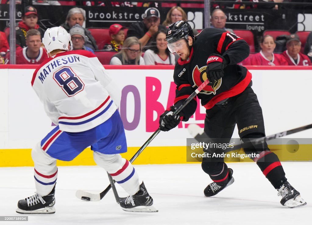 Batherson Drake Batherson of the Ottawa Senators shoots the puck against Mike ...
