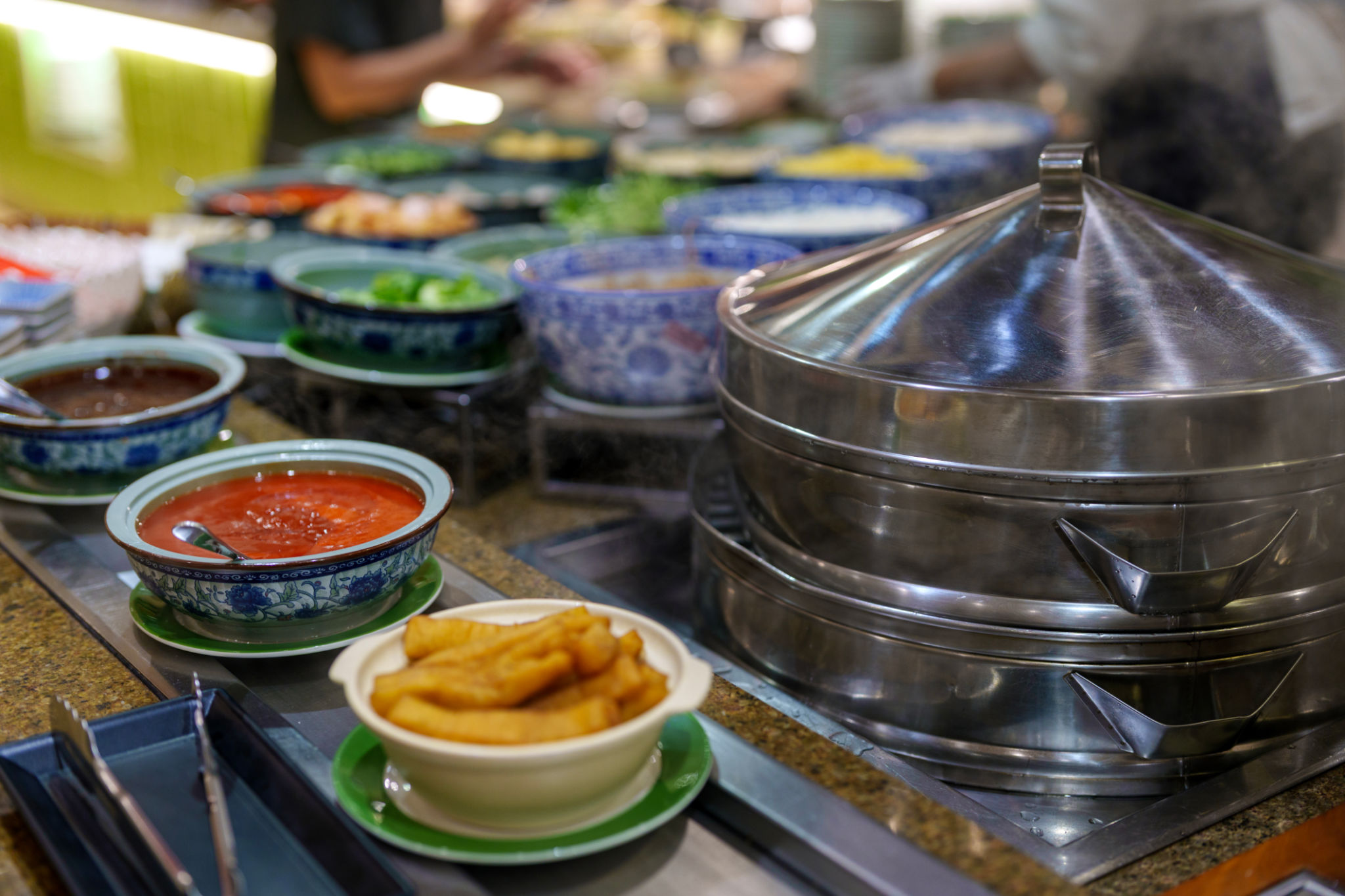 Asian Condiments and Steamer at Hotel Buffet Asian Condiments and Steamer at Hotel Buffet