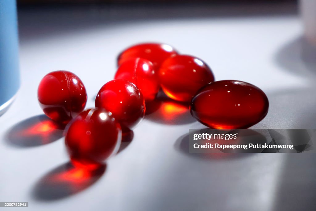 Close up of krill oil pills or globules