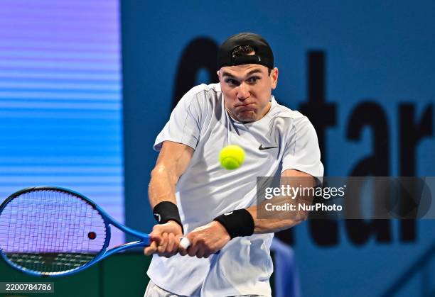 Jack Draper of Britain competes with Andrey Rublev of Russia during the final match of the ATP Qatar ExxonMobil Open 2025 tennis tournament at the...