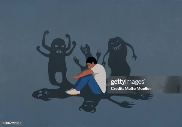 illustrations, cliparts, dessins animés et icônes de shadows of monsters surrounding anxious teenage boy hugging knees - monstre