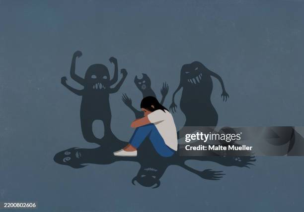 ilustrações de stock, clip art, desenhos animados e ícones de shadows of monsters surrounding anxious teenage girl sitting and hugging knees - fobia