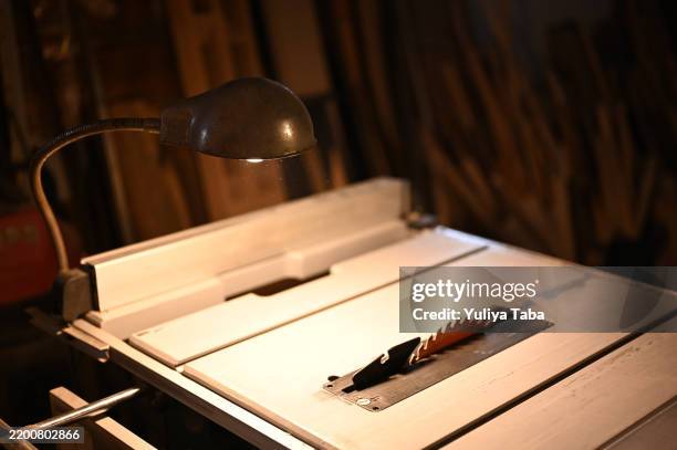 using plywood cutting machine, cutting planks on the table saw - workbench stock pictures, royalty-free photos & images