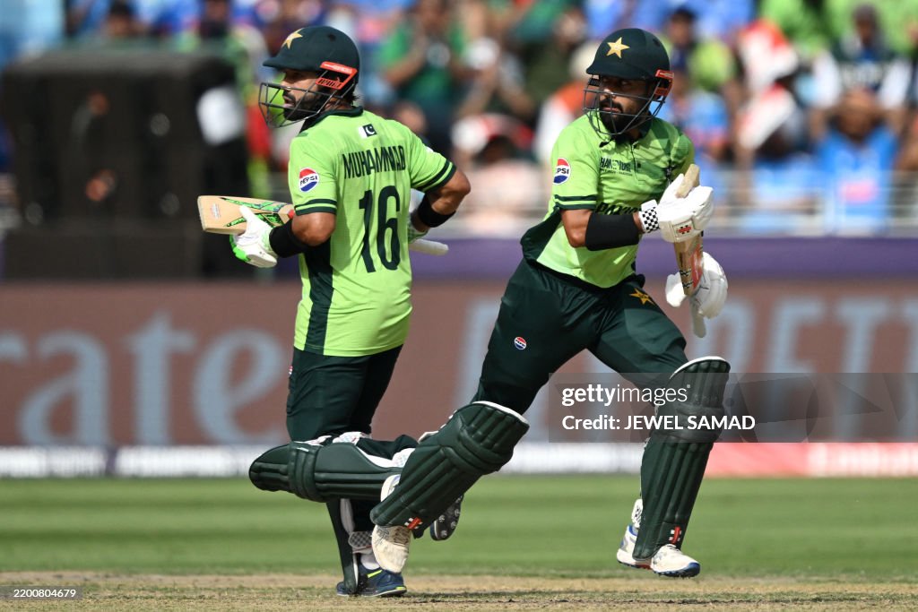 Sake El R Pakistan's captain Mohammad Rizwan and his teammate Saud Shakeel run ...