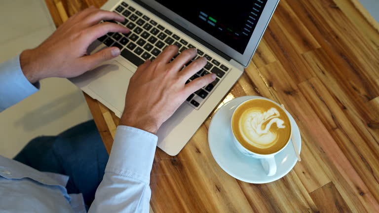https://media.gettyimages.com/id/2200826514/video/unrecognizable-man-using-his-laptop-while-enjoying-a-cappuccino.jpg?b=1&s=640x640&k=20&c=EAC7A8fULa_TTjWdlfwfExPfeKYaLAZu-p5CaI_3is8=