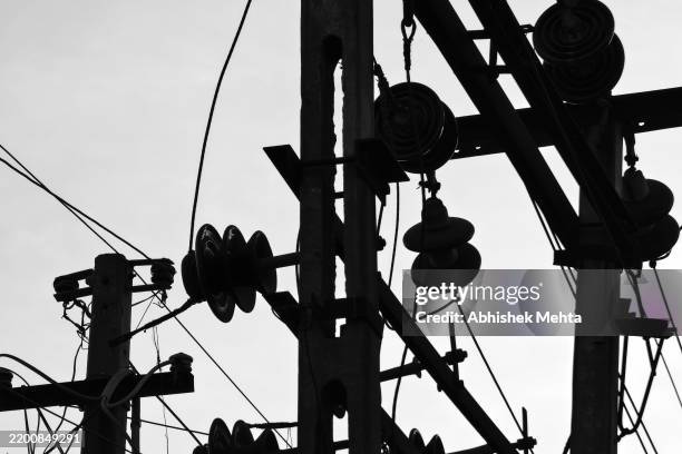 electric transmission lines - electricity pylon stock pictures, royalty-free photos & images