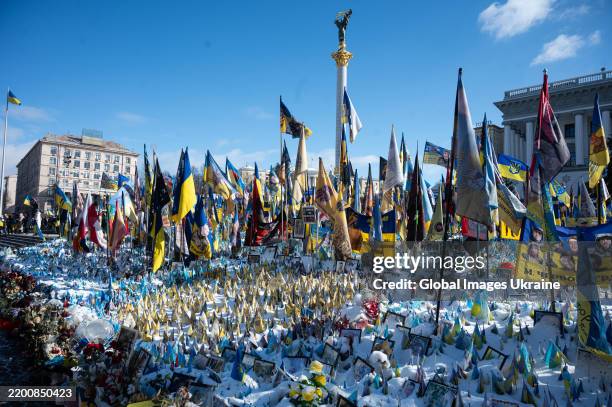 Flags and portraits of fallen soldiers at makeshift memorial to fallen defenders of Ukraine at the Maidan Nezalezhnosti on February 20, 2025 in Kyiv,...