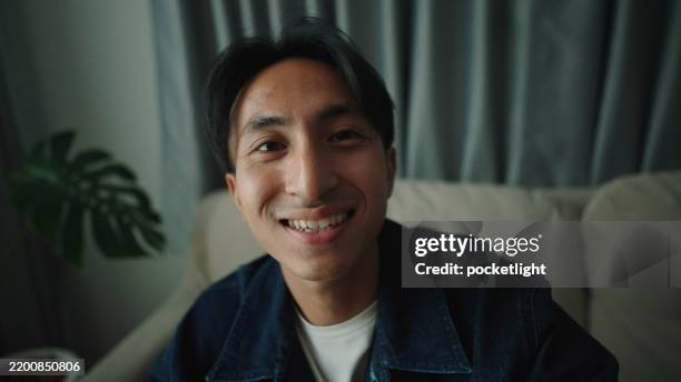 man greeting while video call. - webcam video interview stock pictures, royalty-free photos & images