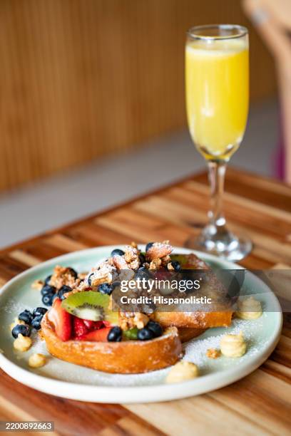 close-up on a delicious breakfast with a mimosa - brunch stock pictures, royalty-free photos & images