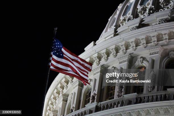 The U.S. Capitol dome is illuminated as the Senate holds a series of votes on February 20, 2025 in Washington, DC. The Senate is set to host an...