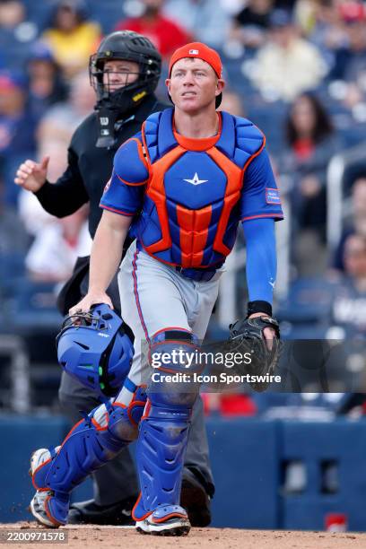 New York Mets catcher Jakson Reetz works behind the plate during an MLB Spring Training baseball game against the Washington Nationals on February...