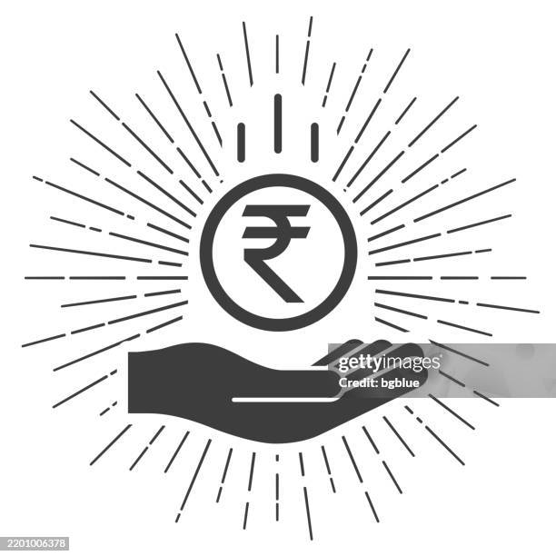 indian rupee coin falling in hand. icon with sunbursts on white background - falling rupee stock illustrations