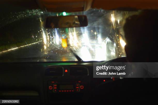 blinding headlights - moving towards stock pictures, royalty-free photos & images