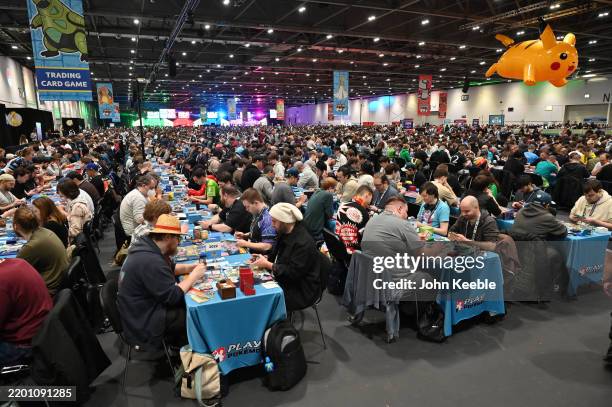 Competitors play Pokemon cards during the during the Pokémon European International Championship 2025 at ExCel London on February 21, 2025 in London,...