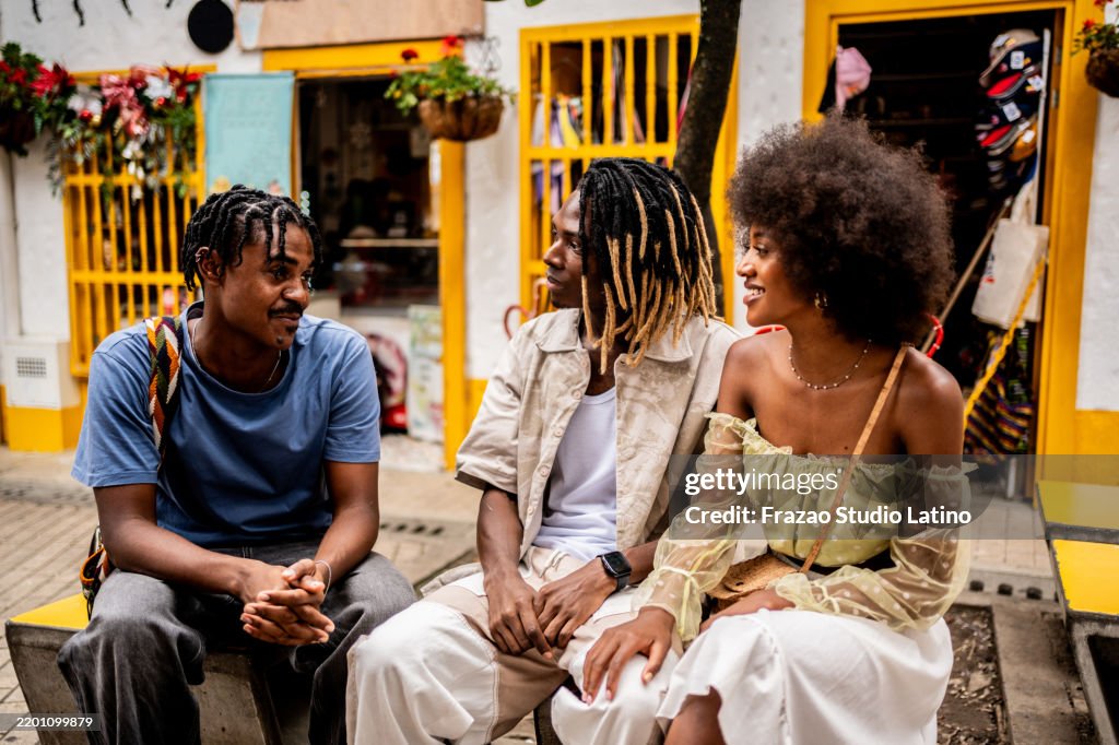 Young friends talking in Medellin, Colombia