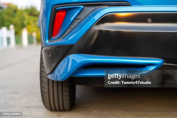 cropped shot of a modern car bumper - parachoques fotografías e imágenes de stock