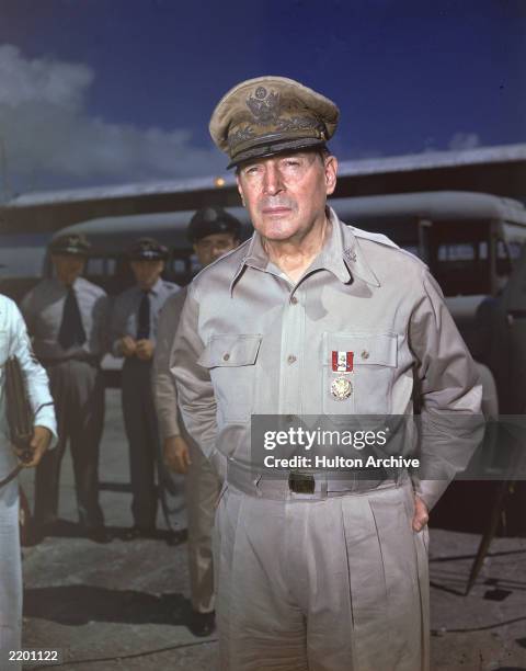 General Douglas MacArthur poses outdoors in uniform, 1940s.