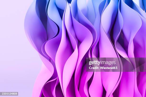 3d rendering of multi colored cloth - blue studio background stock illustrations