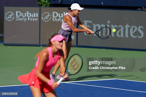 Kristina Mladenovic of France and Shuai Zhang of China in action against Katerina Siniakova of the Czech Republic and Taylor Townsend of the United...