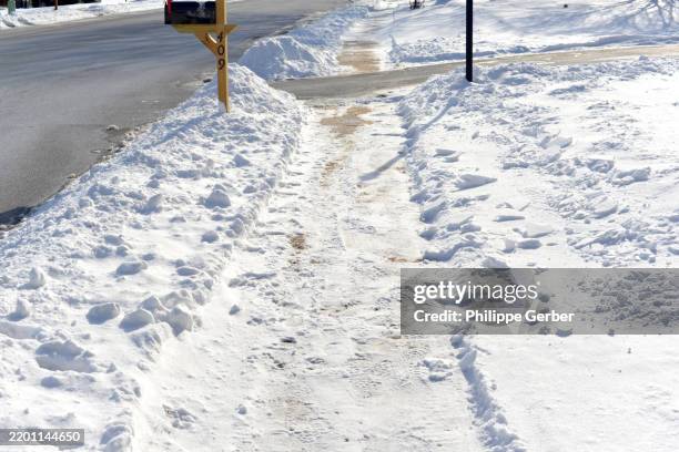 snow-covered sidewalk - post box snow stock pictures, royalty-free photos & images