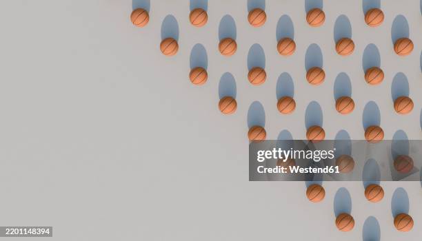 3d render of basketballs arranged in a pattern - basketball background no people stock illustrations
